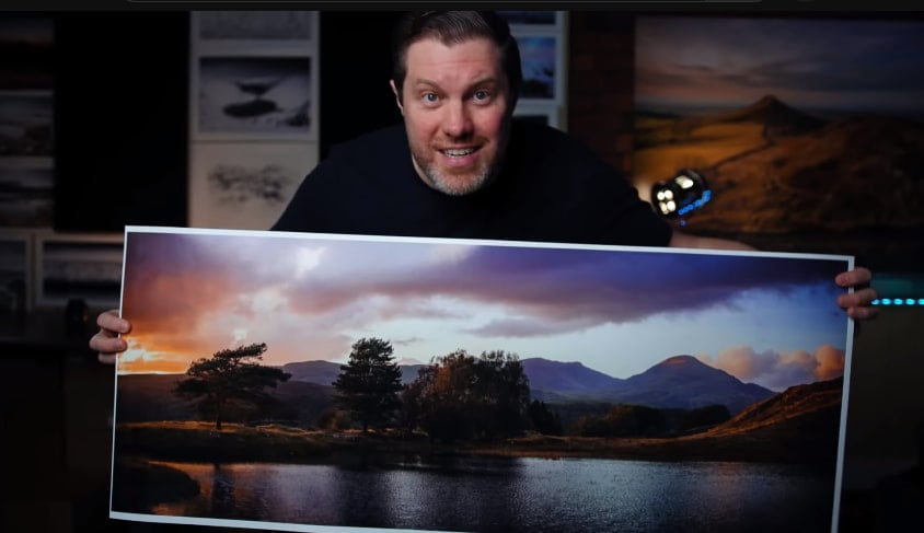 A person talking about a photo print to sell