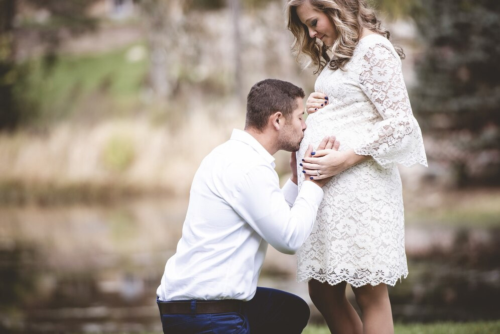 Partner Kneeling with Bump
